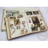 A Victorian scrap album, with twenty three pages of scraps and postcards,