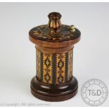 A late 19th century Tunbridge Ware rosewood circular 'Go to bed', with octagonal centre, 10cm,