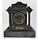 A late Victorian presentation mantel clock of architectural form,