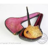 A Victorian Meershaum pipe in the form of a curlew's head and beak, with glass eyes,