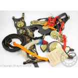 A collection of vintage horse brasses and tack accessories,