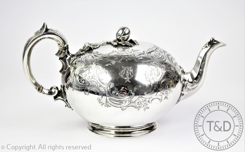 A Victorian silver teapot, Edward and John Barnard, London 1853, of compressed globular form,