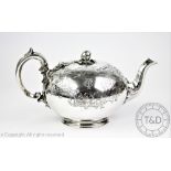 A Victorian silver teapot, Edward and John Barnard, London 1853, of compressed globular form,