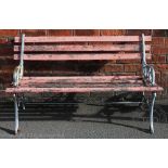 A 19th century style painted metal garden bench,