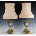 A pair of 19th century gilt metal mounted Sevres style vases, converted to lamps,