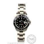 A gentleman's Rolex Oyster Perpetual Date GMT Master, the stainless steel wristwatch circa 2003,