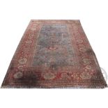 A large Persian Ziegler type hand woven wool carpet,