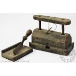 A 19th century pine mouse trap, with dead fall mechanism,