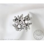 A diamond set dress ring,