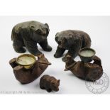 A pair of carved Black Forest bears, modelled as a male and female standing, 10cm and 8.