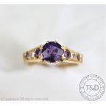 An amethyst and diamond ring,