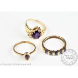 Three gem set rings, to include an abstract amethyst ring in yellow metal stamped '14K', weight 3.