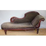 A Victorian mahogany chaise longue,