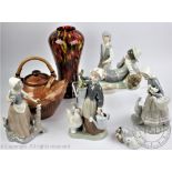 Five Lladro figures, to include; A goose girl 23cm high, a girl with her chickens 24cm high,