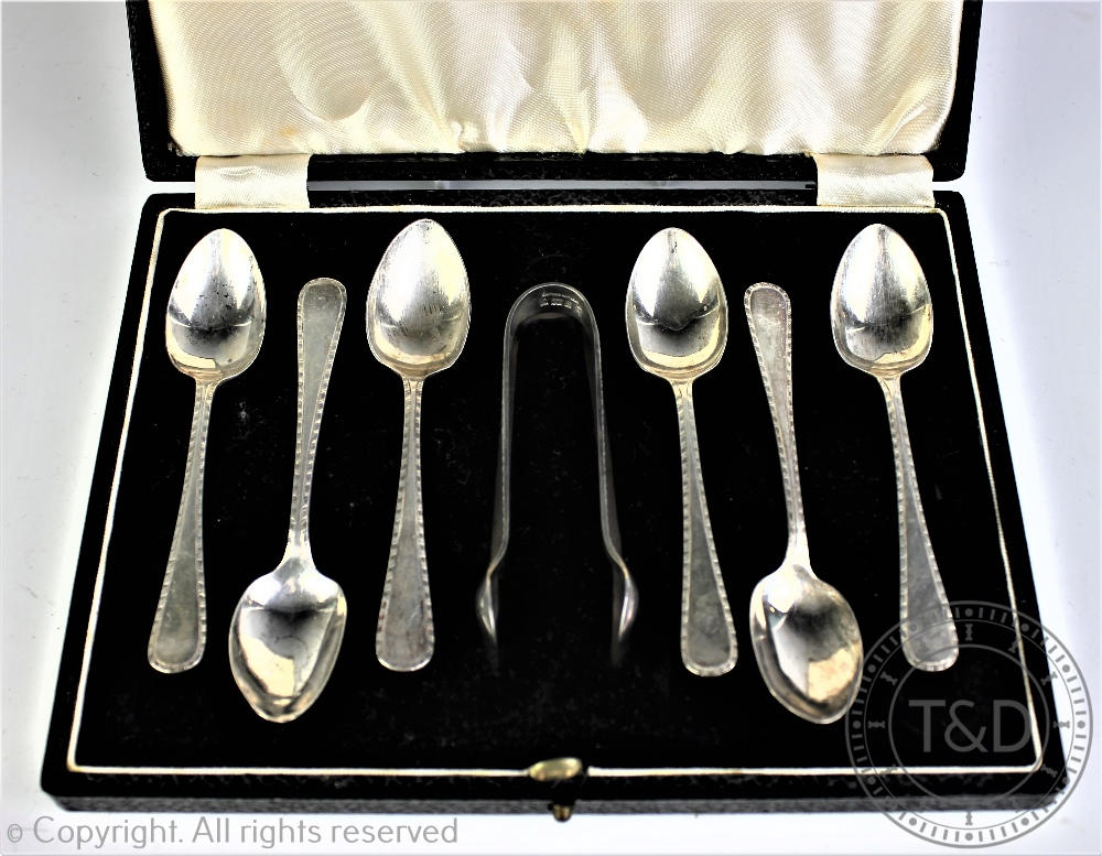 A cased set of six silver teaspoons and sugar tongs, Barker Brothers Silver Ltd, Birmingham 1958, - Image 2 of 2