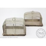 A pair of Asprey & Co silver plated mesh food covers and tray bases,