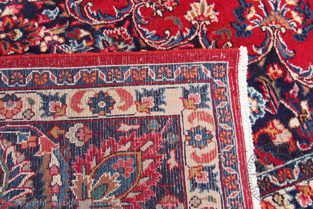 A Persian hand woven wool carpet, - Image 3 of 4