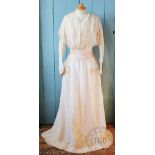 A late 19th century wedding dress,