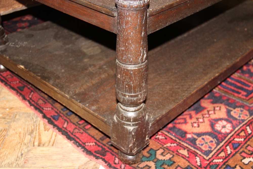 An 18th century and later oak three tier table, with side drawer, on turned legs, - Image 8 of 21