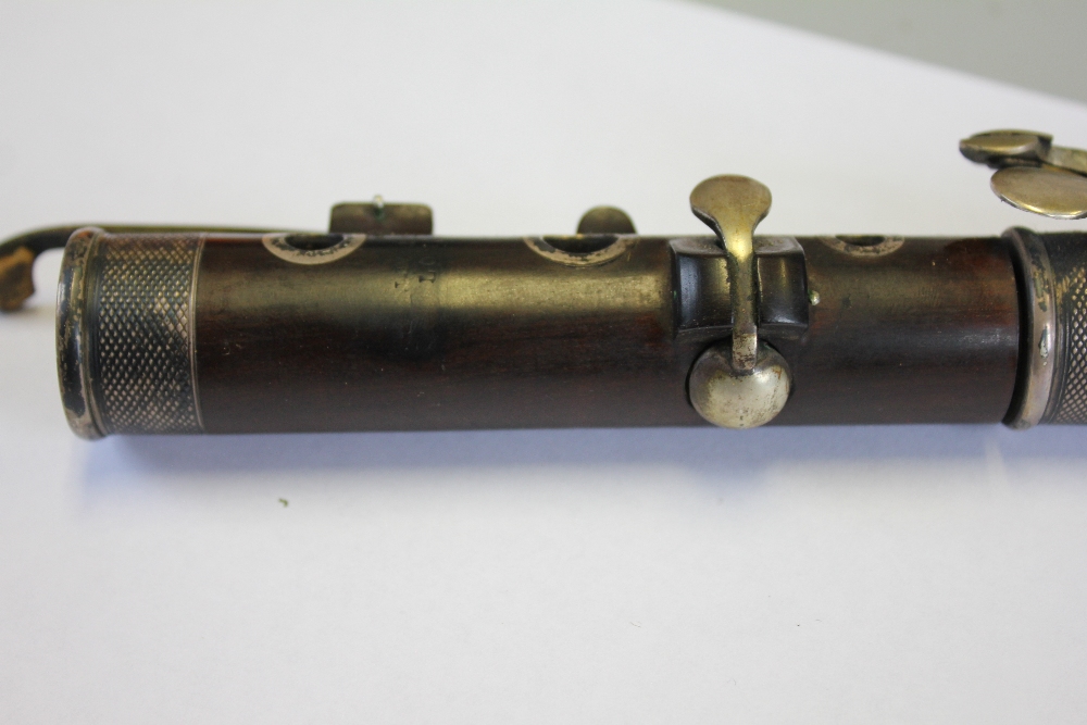 A 19th century rosewood flute by J Wallis, 135 Euston Road, with plated fittings, - Image 10 of 31