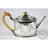 A George III silver teapot, Hester Bateman, London 1781, of straight sided oval form,