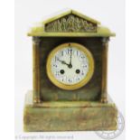 An Edwardian green onyx eight day mantel clock,