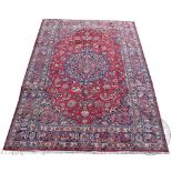 A Persian hand woven wool small carpet,