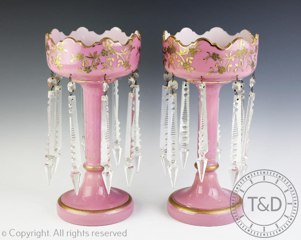 A pair of late Victorian pink opaline glass lustres,