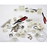 A large quantity of assorted jewellers spares and repairs in yellow and white metal,