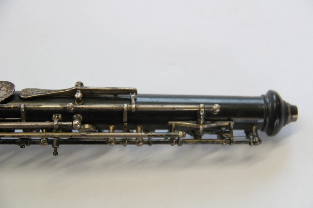 A 19th century rosewood flute by J Wallis, 135 Euston Road, with plated fittings, - Image 29 of 31