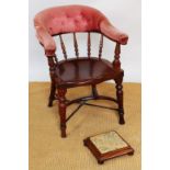 A late Victorian walnut captains type chair,