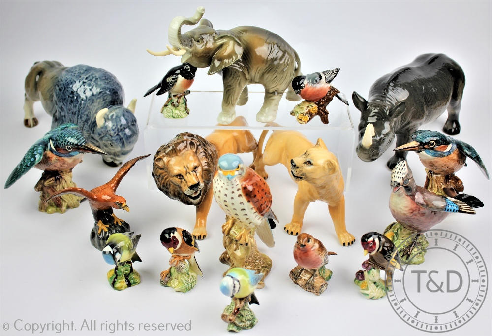 A selection of Beswick birds and wild animals to include two Kingfishers, a kestrel ,