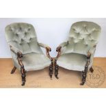 A pair of early Victorian stained wood library chairs,