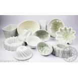 A collection of twelve assorted late 19th century and early 20th century jelly moulds to include