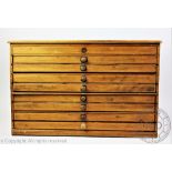 A pine collectors chest of five long drawers, with bun handles, 33cm H x 51.