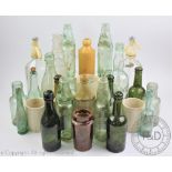 A collection of advertising, Cod and other glass bottles,