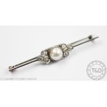A pearl and diamond bar brooch,