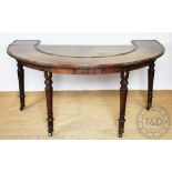 An early 19th century mahogany hunt table,