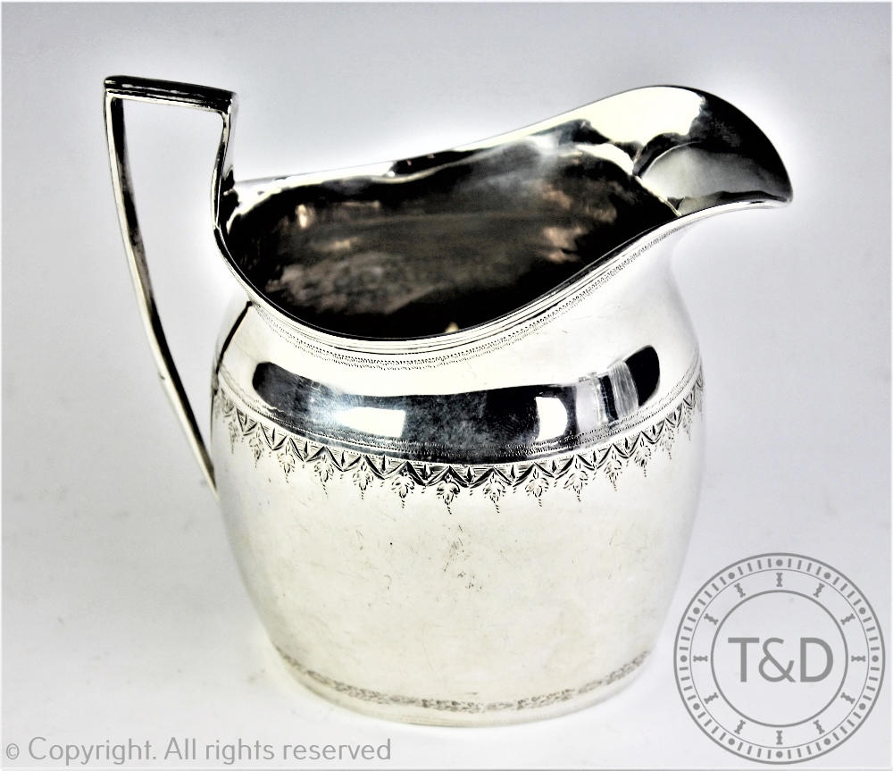 A Victorian silver cream jug, Nathan & Hayes, Birmingham 1891,