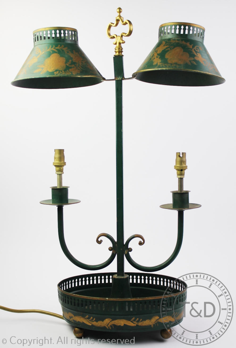 A students desk lamp in the 19th century toleware style,