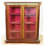An Empire style mahogany glazed display cabinet,