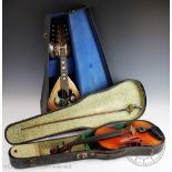 A Victorian mother of pearl and ivory inlaid mandolin label for Francesco Perretti and Figli,