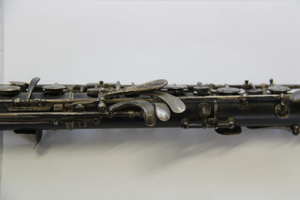 A 19th century rosewood flute by J Wallis, 135 Euston Road, with plated fittings, - Image 24 of 31