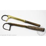 A Victorian telescopic brass salmon gaff with turned hardwood handle,