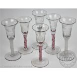 A set of three 19th century style wine glasses,