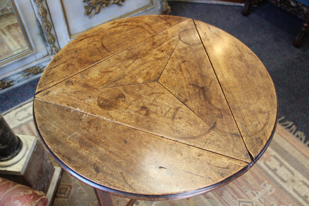 An early 19th century mahogany cricket type table, the rotating circular top with three leaves, - Image 3 of 3
