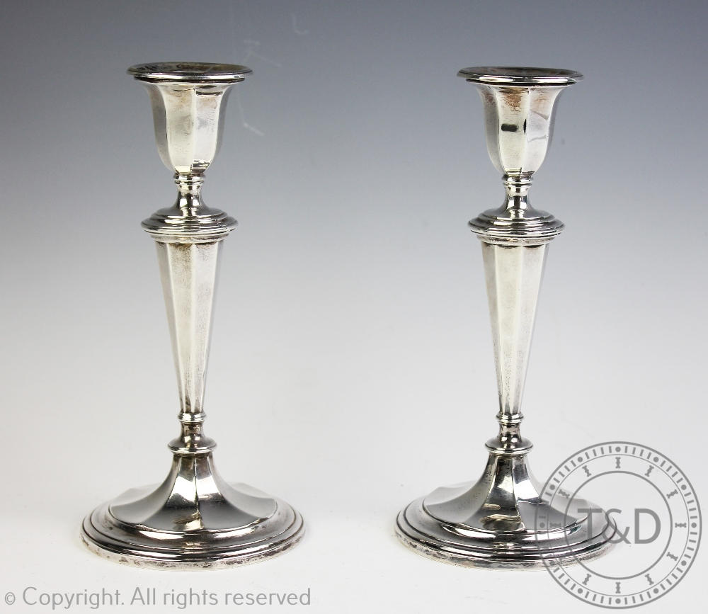 A pair of mid 20th century silver candlesticks, Garrard & Co Ltd Sheffield, 1961, 17.