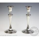 A pair of mid 20th century silver candlesticks, Garrard & Co Ltd Sheffield, 1961, 17.