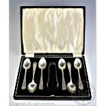A cased set of six silver teaspoons and sugar tongs, Barker Brothers Silver Ltd, Birmingham 1958,