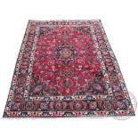 A Persian hand woven wool small carpet,
